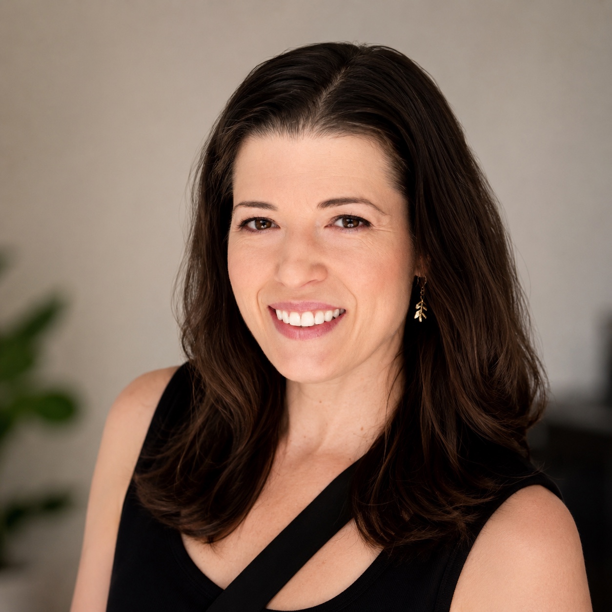 Sarah Haas smiling in a professional headshot